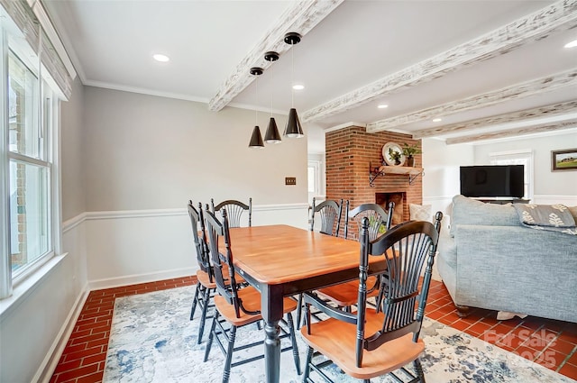 dining area with a wealth of natural light, beamed ceiling, and recessed lighting