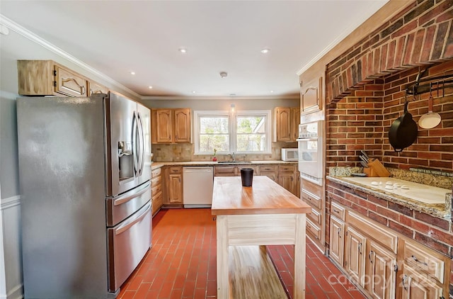 kitchen featuring crown molding, decorative backsplash, brick floor, white appliances, and wood counters