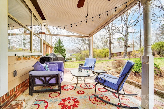 view of patio / terrace featuring area for grilling, outdoor lounge area, and ceiling fan