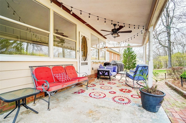 view of patio / terrace featuring ceiling fan