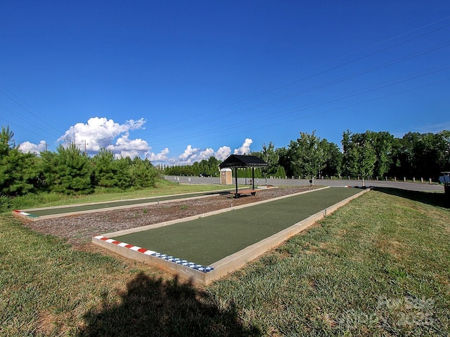 view of home's community with a gazebo and a lawn