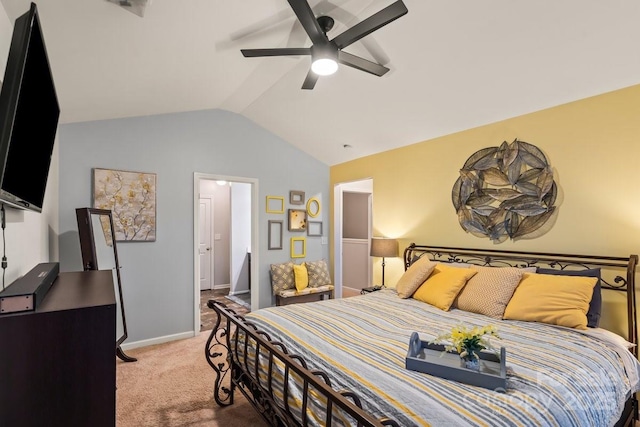 carpeted bedroom with ceiling fan and vaulted ceiling