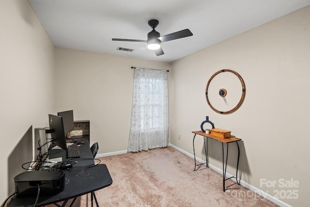 office area featuring ceiling fan and light colored carpet