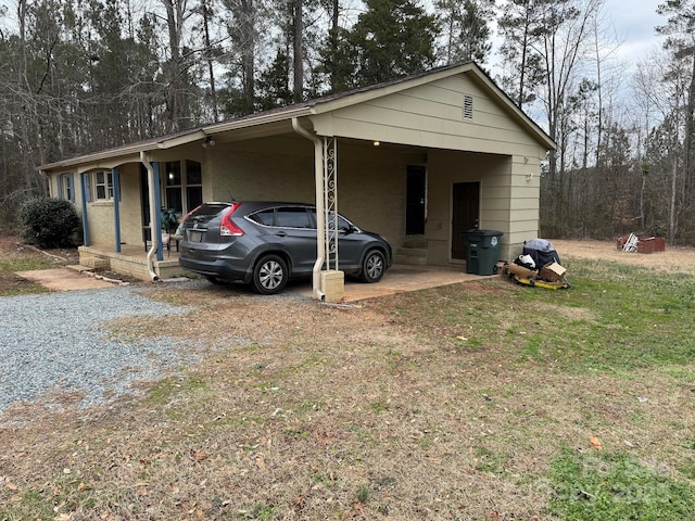 view of front of house with a carport