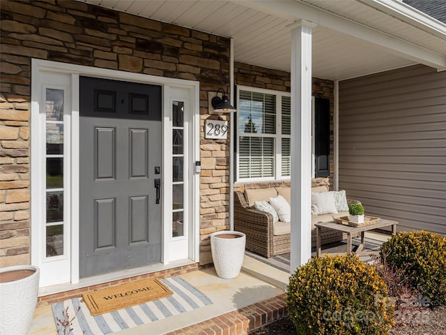 entrance to property with a porch