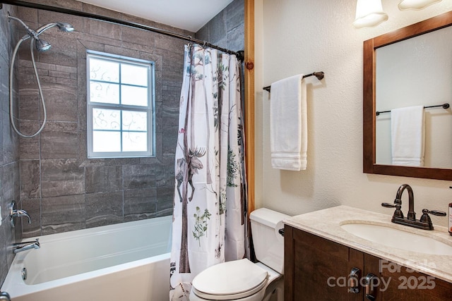 full bathroom with vanity, shower / bath combination with curtain, and toilet