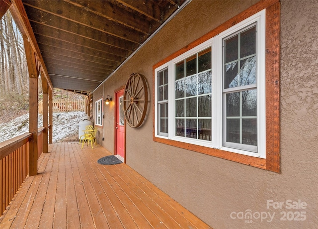 view of snow covered deck