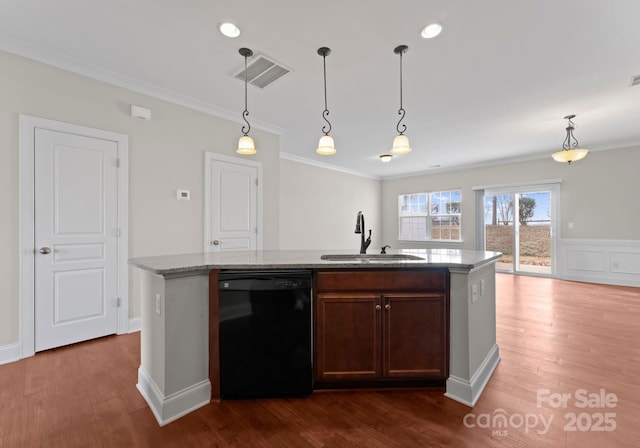 kitchen featuring sink, dishwasher, a kitchen island with sink, and crown molding