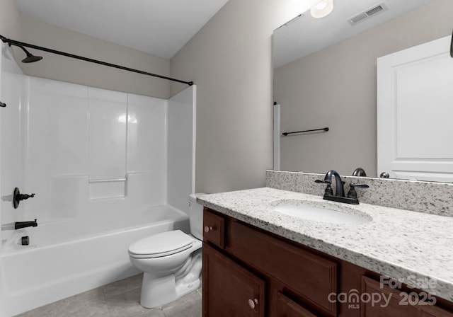 full bathroom featuring vanity, toilet, tile patterned floors, and shower / washtub combination