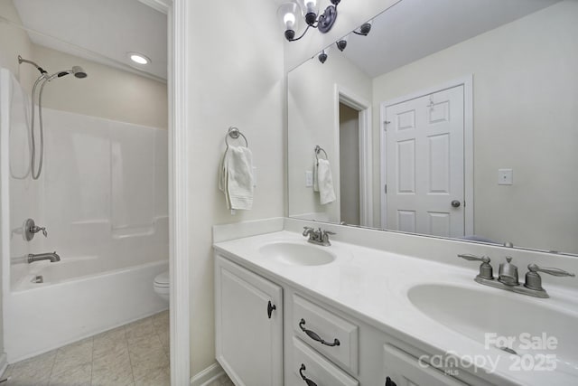 full bathroom with shower / bathtub combination, toilet, and vanity