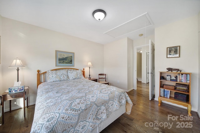 bedroom featuring dark hardwood / wood-style floors