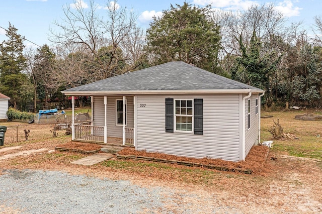 view of outbuilding with a porch