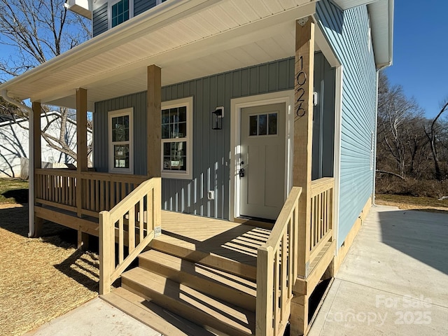 entrance to property with a porch