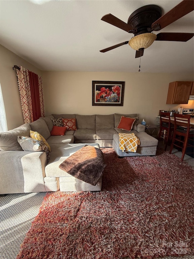 living room featuring ceiling fan