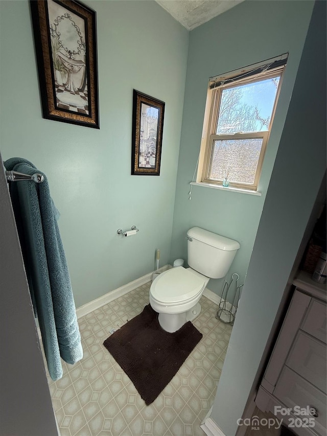 bathroom featuring toilet