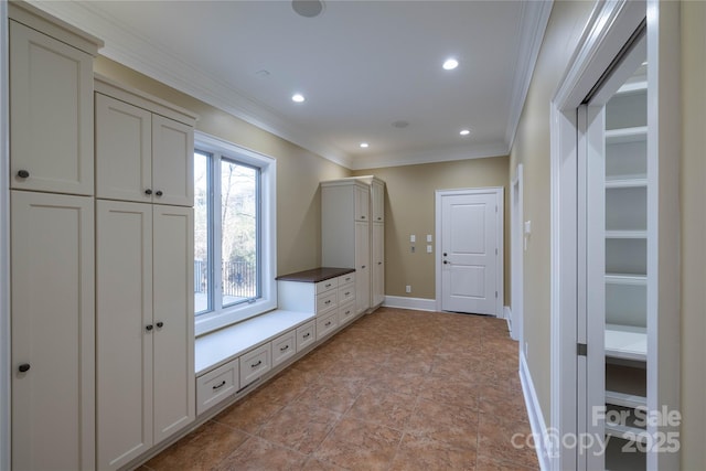 mudroom featuring ornamental molding