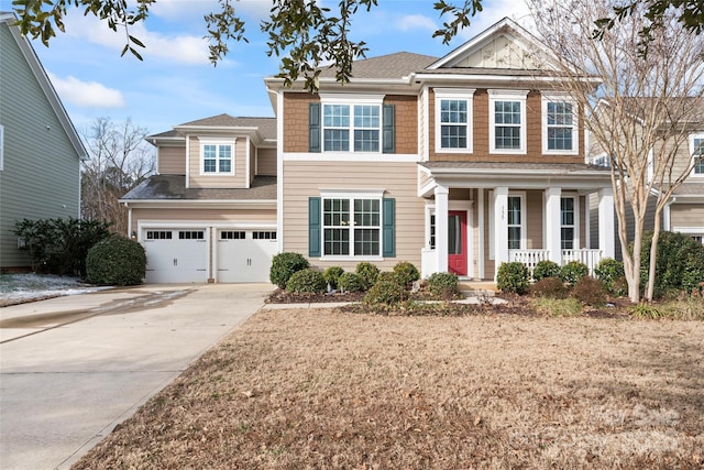 view of front of home featuring covered porch and a garage