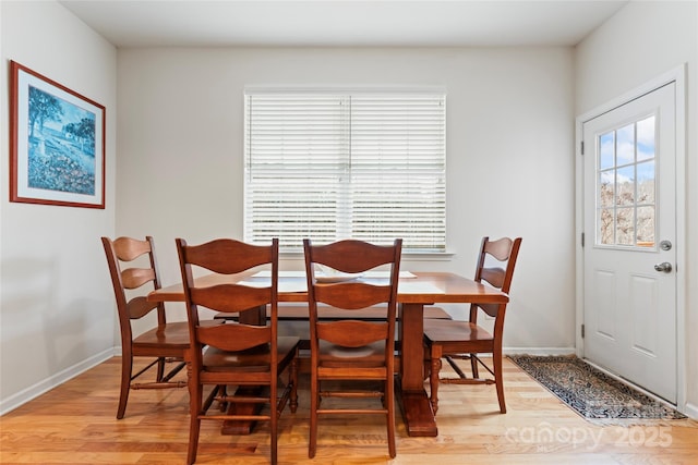 dining space featuring light hardwood / wood-style floors