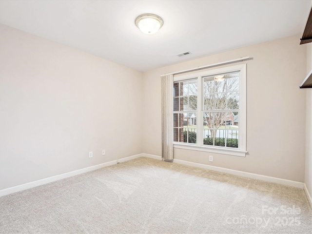 view of carpeted spare room