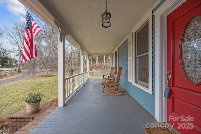 view of patio featuring a porch