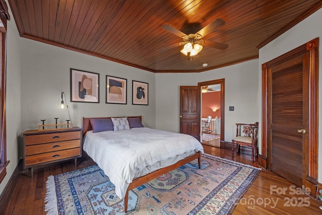 bedroom with dark hardwood / wood-style flooring, crown molding, wooden ceiling, and ceiling fan