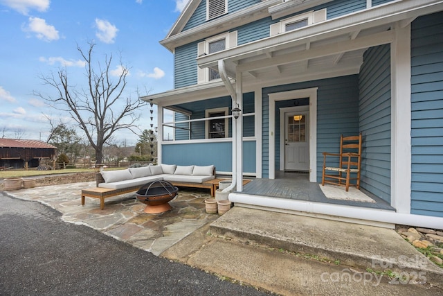 view of exterior entry featuring an outdoor hangout area