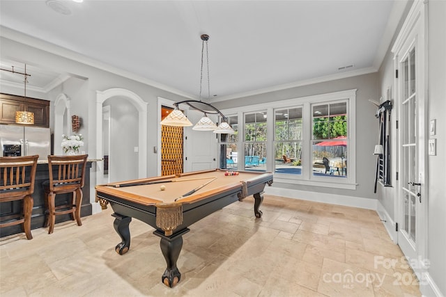 rec room featuring ornamental molding, pool table, bar area, and french doors