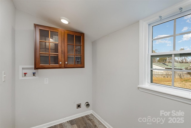 clothes washing area with washer hookup, dark hardwood / wood-style flooring, and electric dryer hookup