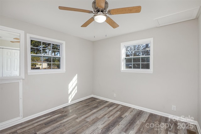 unfurnished room featuring ceiling fan and hardwood / wood-style floors