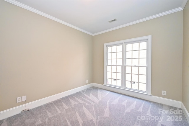 unfurnished room featuring carpet and ornamental molding