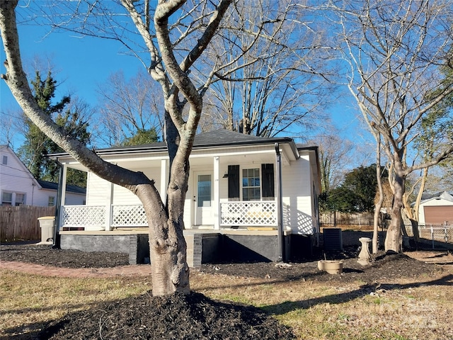 view of front of home with central AC and covered porch