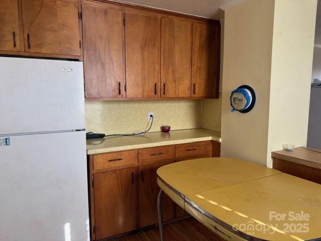 kitchen featuring white fridge