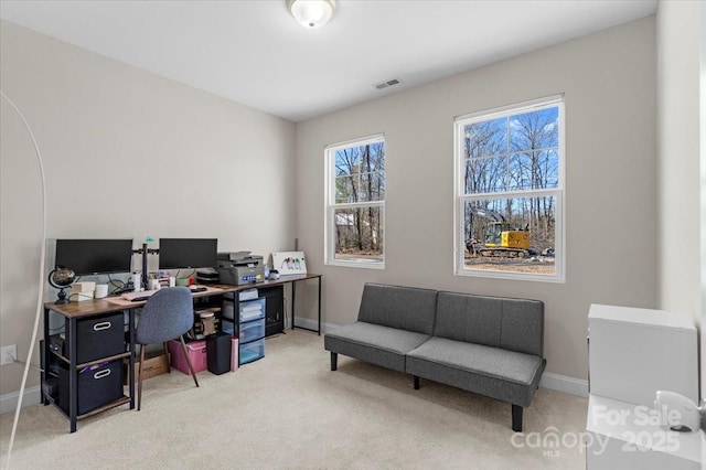 view of carpeted office space