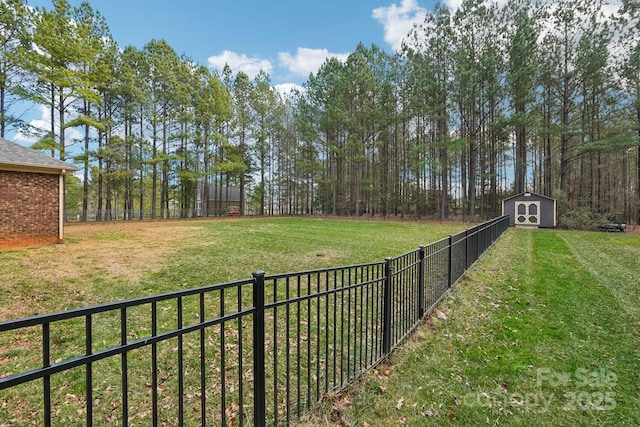 view of yard with a storage shed