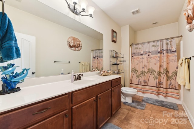 full bathroom featuring vanity, shower / bathtub combination with curtain, tile patterned floors, and toilet