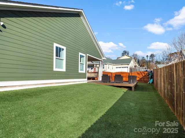 view of yard featuring a deck