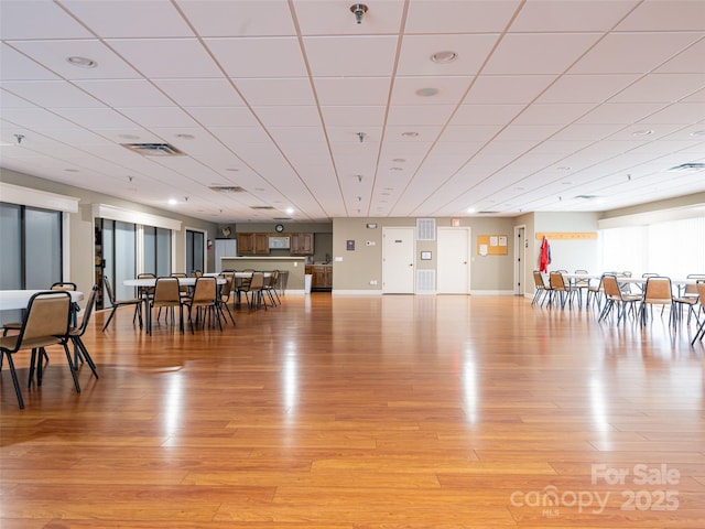 dining space with light hardwood / wood-style floors