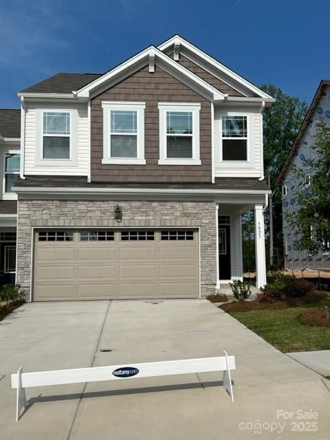 view of front of property featuring a garage