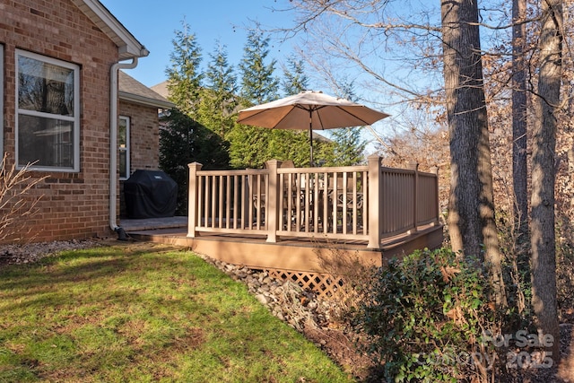 view of yard featuring a wooden deck