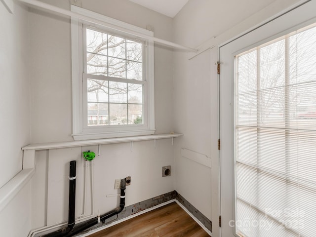 laundry area with hardwood / wood-style floors and electric dryer hookup