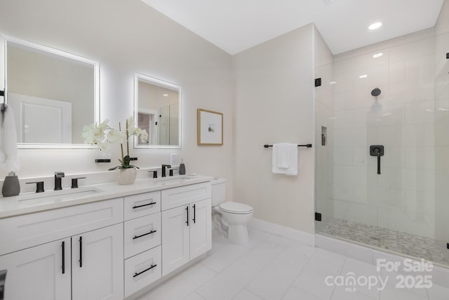 bathroom with toilet, a shower with door, tile patterned flooring, and vanity