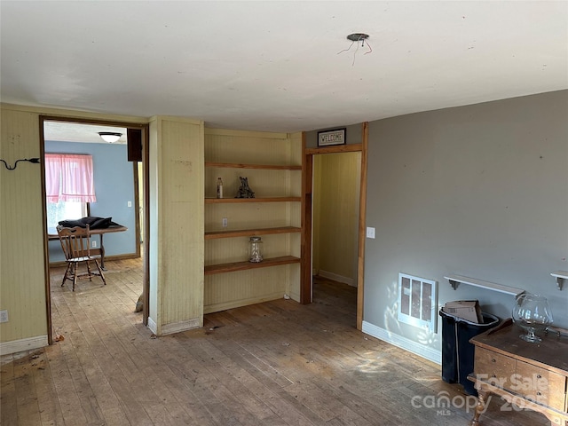 interior space with hardwood / wood-style floors