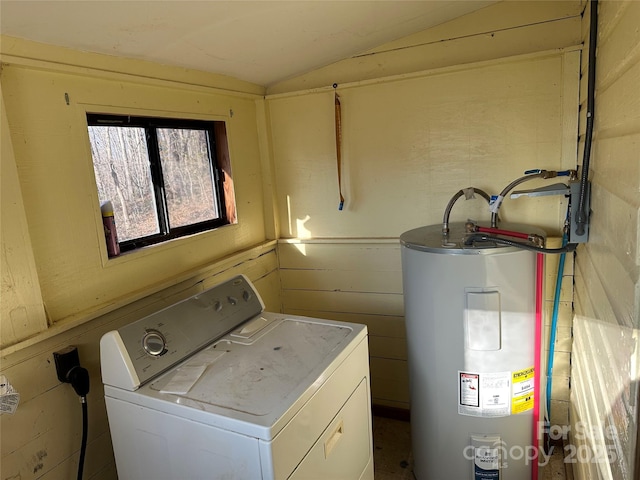 clothes washing area featuring washer / dryer and electric water heater