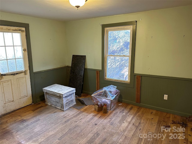 misc room with hardwood / wood-style floors and a wealth of natural light