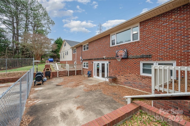 back of property featuring french doors