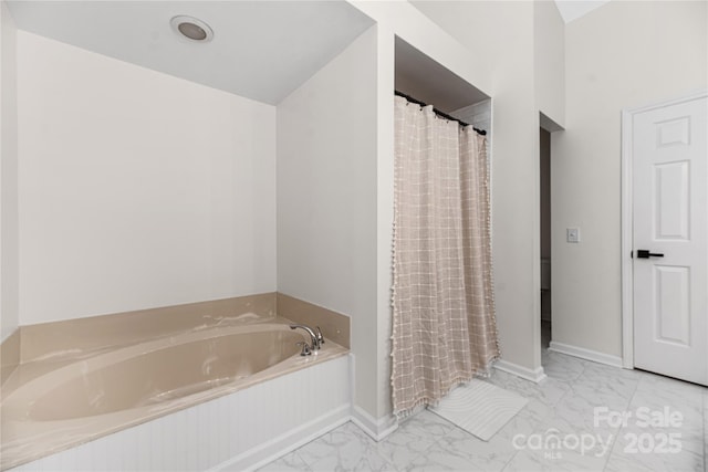 bathroom featuring a bathing tub