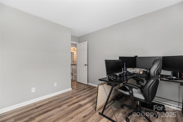 office with hardwood / wood-style flooring