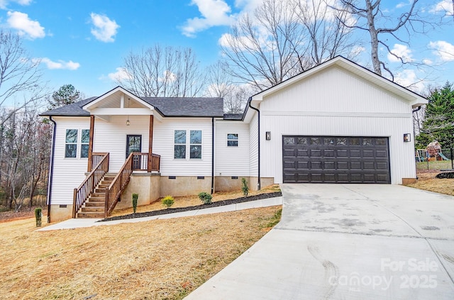 view of front of home featuring a garage, driveway, crawl space, roof with shingles, and a front yard