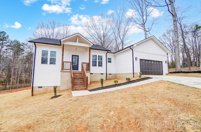 view of front of home featuring crawl space, driveway, a garage, and a shingled roof