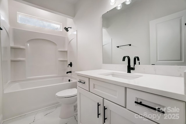 full bathroom featuring marble finish floor, shower / bathing tub combination, vanity, and toilet